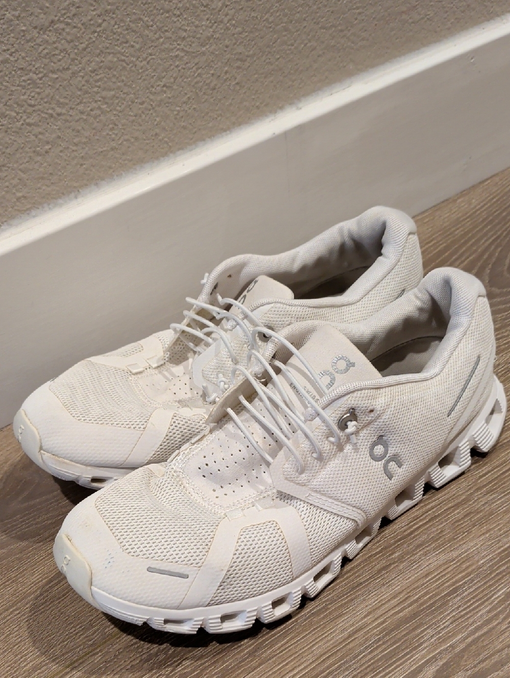 On Running All-White Athletic Shoes